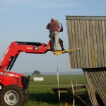 Demolishing the hay barn